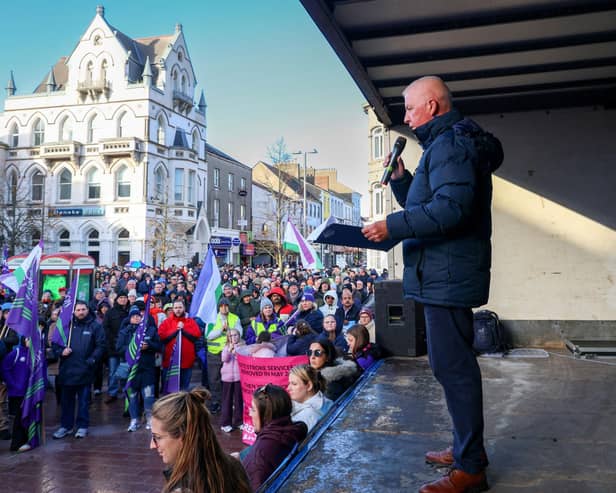 Eddie Curtis from SOS Daisy Hill speaks to crowds in Newry on Sunday about the closure of maternity services. NM264370