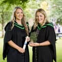 Abbie Thompson, Planning and Production Support at Dale farm pictured with Maria Mullan, Assistant Powder Production Manager who also received the Department of Agriculture, Environment and Rural Affairs prize for achieving the highest marks on the BSc (Hons) Degree in Food and Drink Manufacture. Credit: Brian Morrison