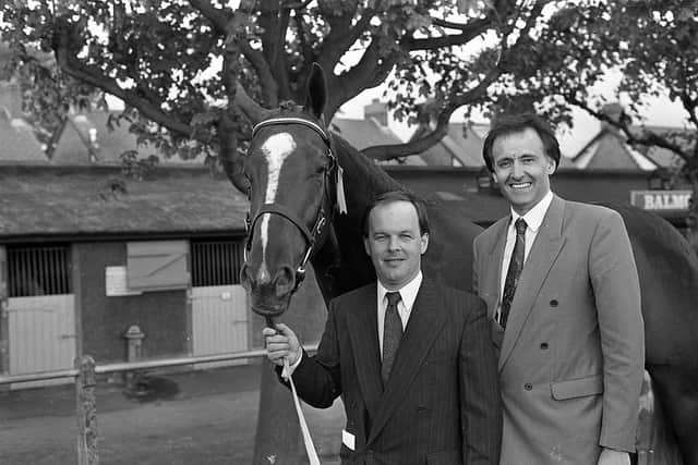 Pictured in May 1992 is Philip Houston of Banbridge and Ronnie Morton from Trustee Savings Bank show off TSB Sheer Delight, winner of the three-year-old young stock horse competition at the Balmoral Show that year. Picture: News Letter archives/Darryl Armitage