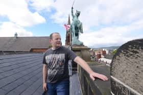 Ron McDowell pictured on the roof of Clifton Street Orange Hall, Belfast
