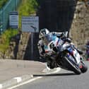 Michael Dunlop (ROKiT BMW) on his way to victory in a controversial Briggs Equipment Superbike race at the 2025 North West 200 from Davey Todd (8TEN Racing BMW). (Photo by Rod Neill/Pacemaker Press)