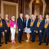 Carla Lockhart gave Chris Heaton-Harris a tour of Brownlow House during the Co Armagh Twelfth in Lurgan