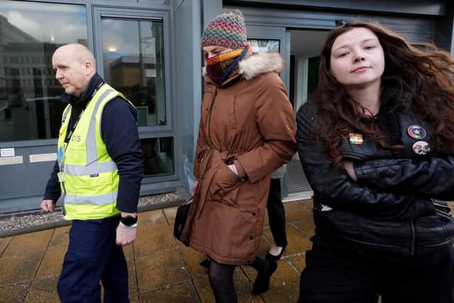 Dr Upton (centre) leaves an employment tribunal in Dundee, where Sandie Peggie, is taking Fife Hospital Board to tribunal regarding Dr Upton, a trans doctor, being permitted to use a female changing room while transitioning. Picture: Andrew Milligan/PA Wire