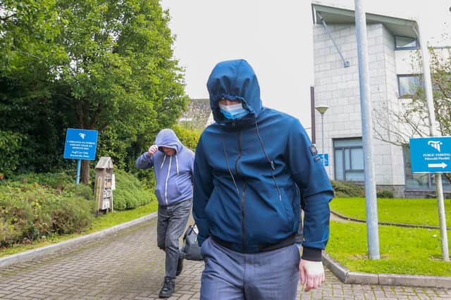Sergee Kelly (right) leaving Carrick-On-Shannon Courthouse after being released on bail on charges relating to the hit-and-run incident that led to the death of 9-year-old Ronan Wilson from Kildress in Co Tyrone, in the Donegal town of Bundoran. Photo: Liam McBurney/PA Wire