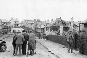 Surveying the damage to Hazeldene Gardens, Bangor, in the aftermath of a 1941 air raid that killed five people. Photo courtesy of North Down Museum.
