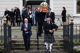 The coffin of Maud Kells is piped out of Molesworth Presbyterian Church in Cookstown after her funeral.  Pic: Declan Roughan/PressEye