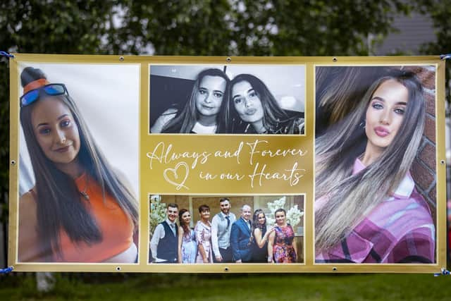A banner with pictures of Chloe Mitchell at King George's Park in Harryville, Ballymena, in remembrance of Ms Mitchell. 
Photo: Liam McBurney/PA Wire