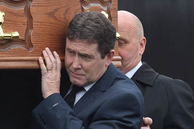 Colin Worton carries his mother Beatrice Worton's coffin in 2019. Her son Kenneth, Colin's brother, was murdered in the Kingsmills Massacre in 1976. She had hoped to see a positive outcome of the legacy inquest into his murder, however the process, which began in 2014, has still not finished, and is holding its final evidence hearing tommorrow, Friday 31 March 2023.