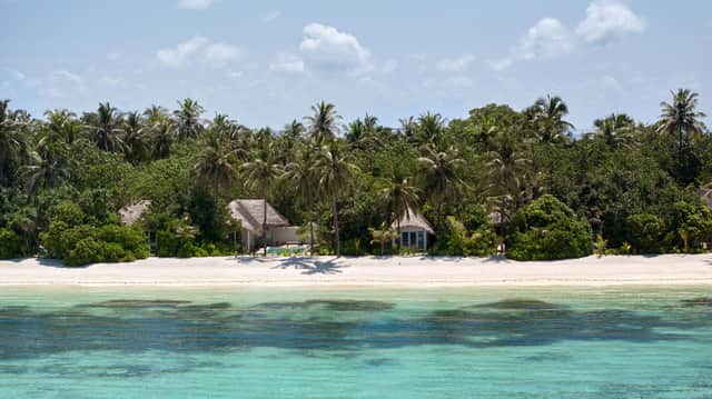 A beach villa suite at the Six Senses Kanuhura Resort in the Maldives.