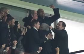 The Prince of Wales celebrates Aston Villa's third goal in the stands during the UEFA Europa League match at Villa Park, Birmingham