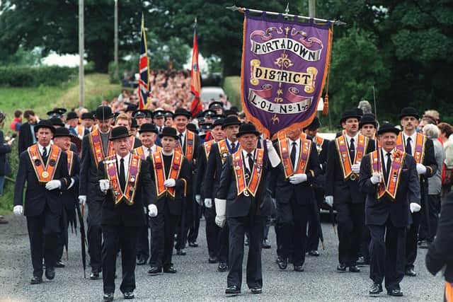 File photo dated 5/7/1998 of members of the Orange Order march to Drumcree church, Portadown. The Government could not give a guarantee that electricity supplies would be maintained in the event of politically-motivated industrial action arising from the Drumcree dispute, an official said in 1998.
