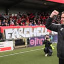 Crusaders manager Stephen Baxter celebrates with the club's fans after winning the European play-off final. PIC: David Maginnis/Pacemaker Press