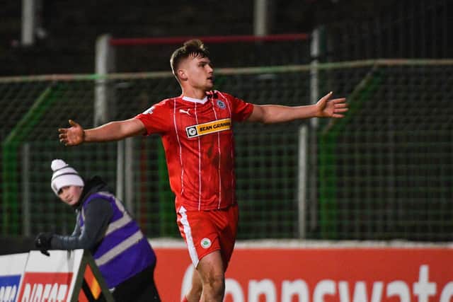 Cliftonville's Odhran Casey headed a late equaliser to earn a point against Glentoran in a 2-2 draw at The Oval