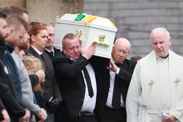 Dean Wilson (centre left), the father of Ronan Wilson, carries his coffin from St. Mary's Church, Dunamore, after his funeral service. The nine-year-old was killed in a hit-and-run in Bundoran, Co. Ireland, while on holiday with his family.