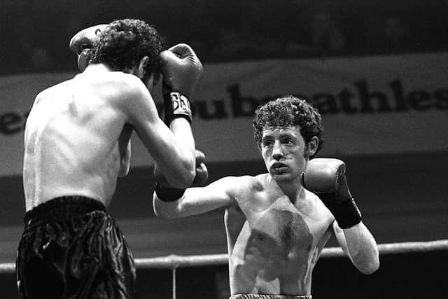 Hugh Russell v John Feeney. Weight Title fight at Ulster Hall, Belfast. Russell won the title from Feeney in 13th round after Feeney was disqualified for butting with his head.