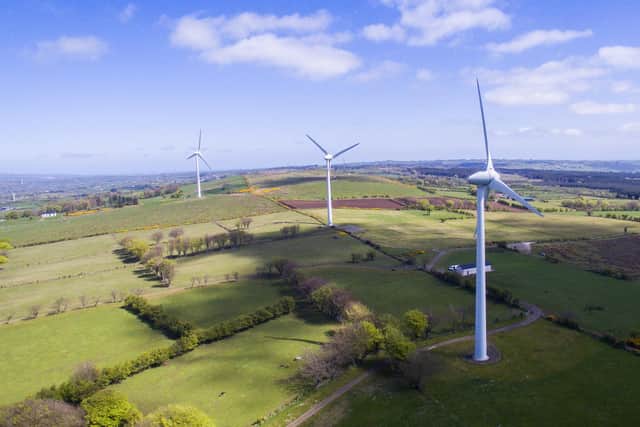 A new report has revealed that in 2023, Northern Ireland spending on gas was cut by £243 million by local wind energy generation. Pictured is Carn Hill Wind farm