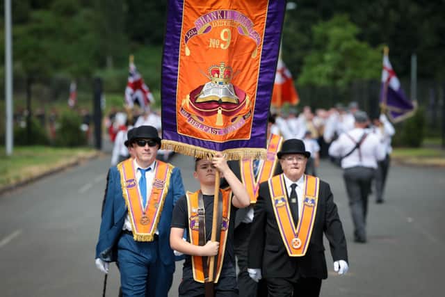 Press Eye - Belfast - Northern Ireland - 24th June 2023The Whiterock parade in west Belfast takes place. The Parades Commission had ruled that banners relating to World War One must remain furled for part of the route.Members of the Orange Order and marching bands pictured at they head onto the main Springfield Road in Belfast as they take part in the annual ‘Whiterock Parade’ in west BelfastPicture by Matt Mackey/PressEye