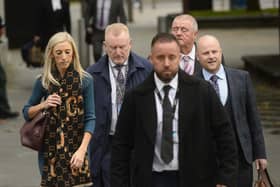 Carla Lockhart of the DUP arrives with with Orange Order legal representative and loyalist spokesperson Jamie Bryson (far right), at Laganside Courts in Belfast, where the Garvaghy Road residents have launched a legal bid to overturn a determination which permits the Orange Order to walk down the mainly nationalist street in Portadown.