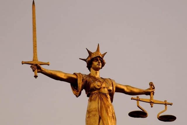 A man has been charged over a hit-and-run which resulted in the death of a man and a woman sustaining serious injuries last year.