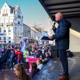 Eddie Curtis from SOS Daisy Hill speaks to crowds in Newry on Sunday about the closure of maternity services. NM264370