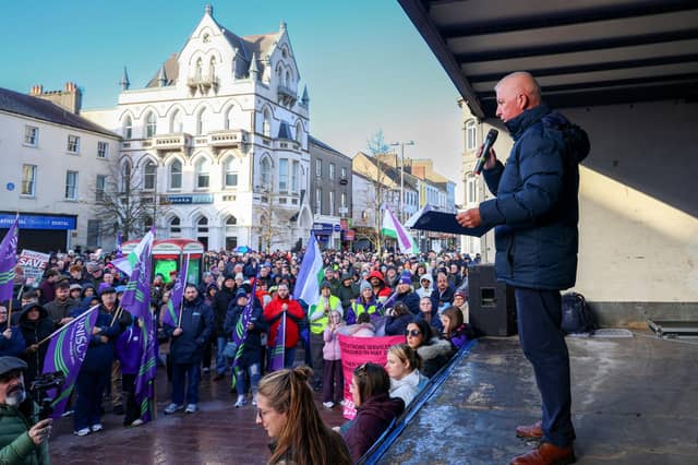 Eddie Curtis from SOS Daisy Hill speaks to crowds in Newry on Sunday about the closure of maternity services. NM264370