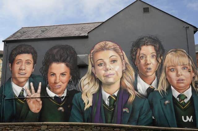 The Derry Girls mural featuring the much-loved main characters which is very popular for getting your picture taken in front of in the Maiden City