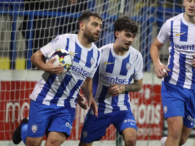 Coleraine striker Davy McDaid wheels away in celebration after netting in the 1-1 draw against Carrick Rangers