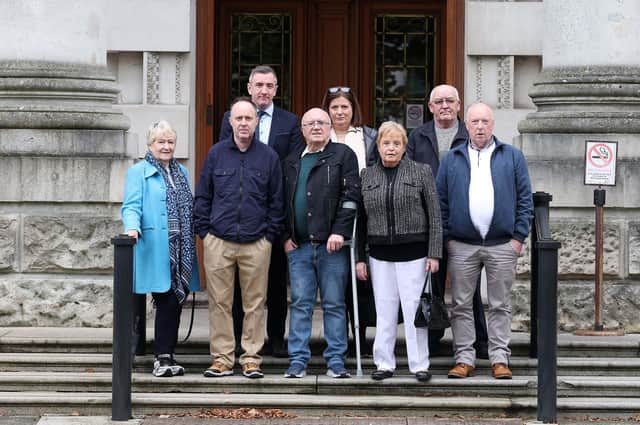 John McEvoy (centre) pictured at the High court with other survivors of terrorism and supporters