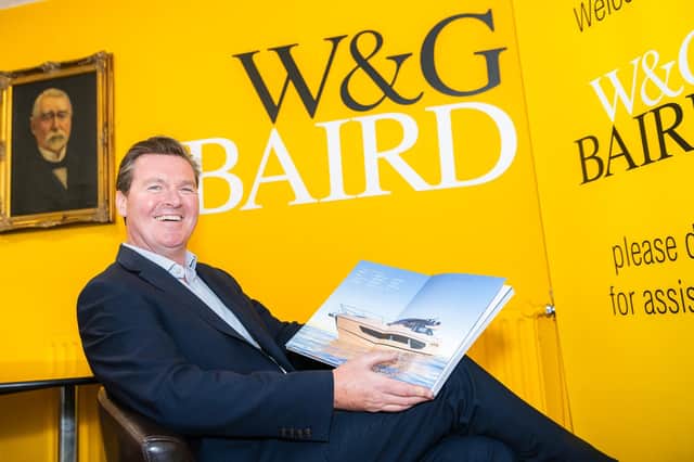 David Hinds, director at W&G Baird in Antrim is pictured with ‘The Range’ Sunseeker brochure.  and is set to captivate a global audience during the highly anticipated Southampton Boat Show, this weekend