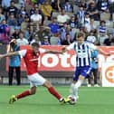 Larne’s Andy Ryan gets away from HJK Helsinki’s Topi Keskinen  and Lucas Lingmann during the Champions League first qualifying round first-leg game at the Bolt Arena in Finland. (Photo by Dean Houston/Pacemaker Press)