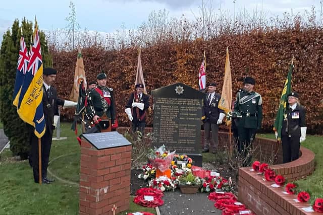 Veterans pay their respects to those murdered 40 years ago in the BallyKelly Bombing following a remembrance service at Tamlaghtfinlagan Parish Church on Sunday. The names of all 17 people killed are listed on the memorial pictured.