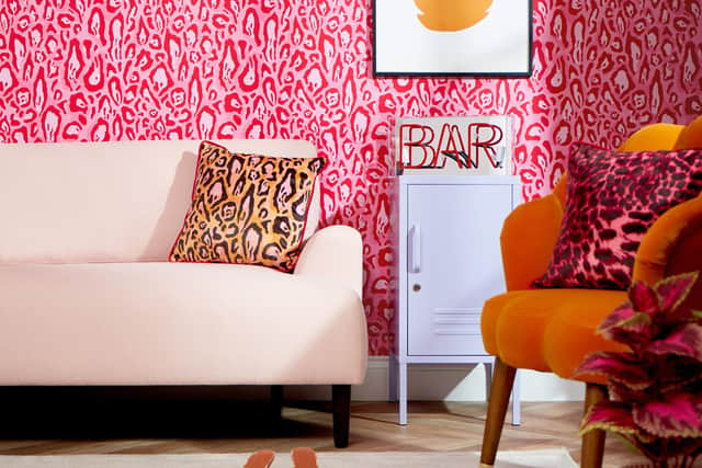 Animal Instinct Wallpaper in Candy Pink and Red, £45 per roll, Lust Home.