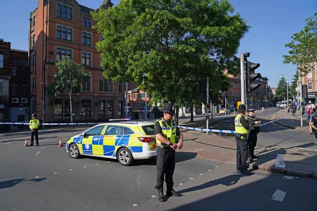 Police officers at the Maid Marian Way junction of Upper Parliament Street in Nottingham, as police have put in place multiple road closures in Nottingham as officers deal with an ongoing serious incident