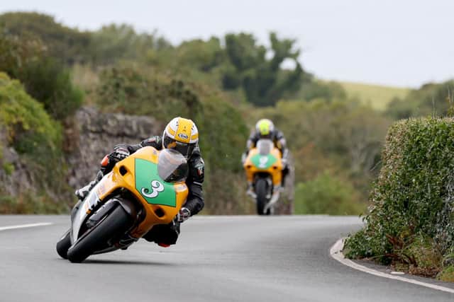 Mike Browne on his way to victory in the Lightweight race at the Manx Grand Prix in 2023 from LayLaw Racing team-mate and runner-up Ian Lougher