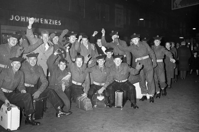Royal Scots arrive at Princes Street Station after a spell serving in Berlin in February 1960.