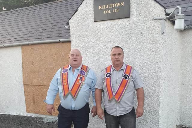 Members of Kilntown Orange Lodge in Dromore Co Down, Wesley Redmond and Paul Gribben, after windows were smashed in a sectarian attack which the PSNI is treating as a hate crime.