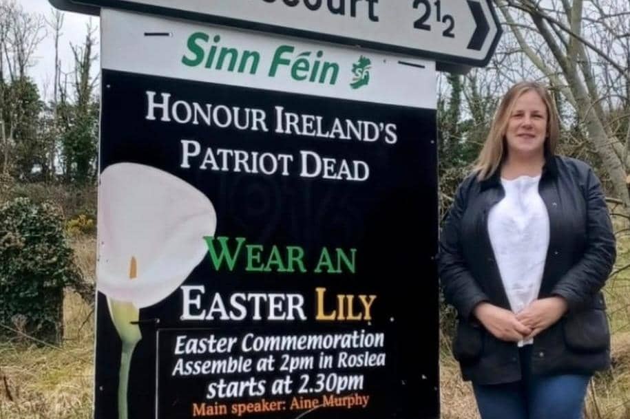 An Easter banner bearing Sinn Fein's livery was hung from a Co Fermanagh road sign earlier this year, and party councillor Elaine Brough was pictured posing next to it.