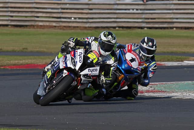 Christian Iddon (Tyco BMW) edegd out Richard Cooper (Buildbase Suzuki) on a thrilling last lap to win the Sunflower Trophy race at Bishopscourt in 2019.