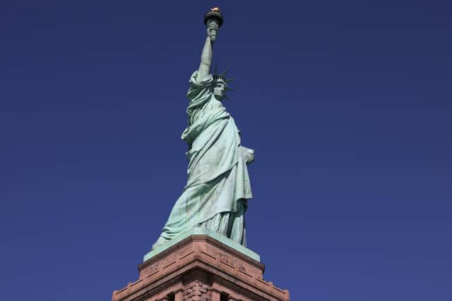 The Statue of Liberty is seen on October 11, 2022 in New York City. The crown and pedestal of the Statue of Liberty opened up to the public for the first time since its closure in March 2020 due to the coronavirus (COVID-19) pandemic.   (Photo by Michael M. Santiago/Getty Images)