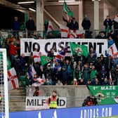 Northern Ireland fans with a banner in the stands ahead of the UEFA Euro 2024 qualifying match at Windsor Park, Belfast. Photo: Liam McBurney/PA Wire