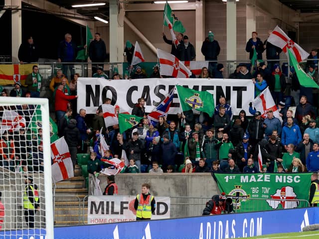 Northern Ireland fans with a banner in the stands ahead of the UEFA Euro 2024 qualifying match at Windsor Park, Belfast. Photo: Liam McBurney/PA Wire
