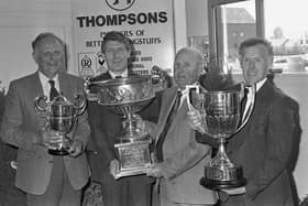 Pictured in May 1992 at the Ballymoney Show is Victor Truesdale, second left, of John Thompson, presenting the company’s livestock championship awards to, Alfie Martin, Crumlin (best Large White pig of opposite sex to the champion), Robert Kerr, Ballymoney (best Large White pig in show) and Robert Wallace, Antrim (best Holstein Friesian in show. Picture: News Letter archives/Darryl Armitage