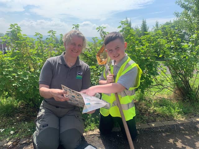 Eight-year-old Kohen Fitzsimmons, who found the first recorded location of a water stick insect in Northern Ireland in Bog Meadows Nature Reserve while pond-dipping with his Holy Trinity Primary School classmates. Issue date: Friday May 17, 2024. PA Photo