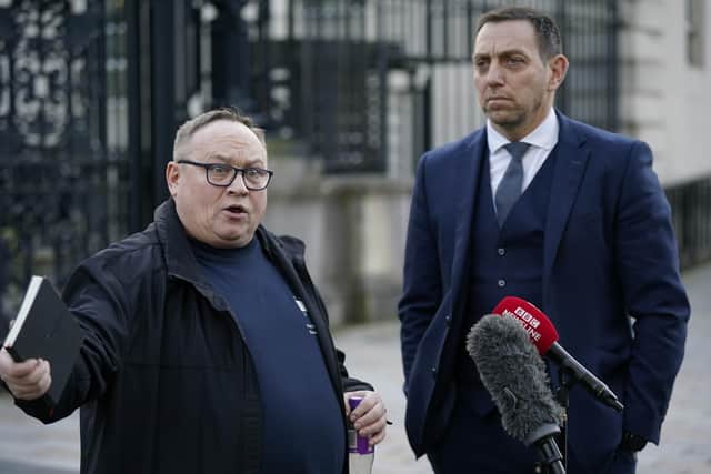 Neil Colwell (left), Steven Colwell's brother, and solicitor Padraig O'Muirigh speak outside Belfast High Court following the inquest into the death of his brother. Picture date: Wednesday February 21, 2024. PA Photo: Niall Carson/PA Wire