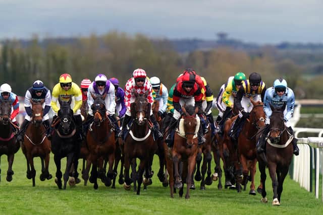 Runners and riders during the opening race, the William Hill Handicap Hurdle, on day three of the 2024 Randox Grand National Festival at Aintree Racecourse, Liverpool. (Photo by Bradley Collyer/PA Wire).
