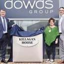 Northern Ireland construction firm Dowds Group have officially rename their new Ballymena headquarters following recent merged of their Belfast and Ballymoney offices. Pictured are John Francis Dowds, co-founder, Mayor Gerardine Mulvenna and James Dowds, Group managing director
