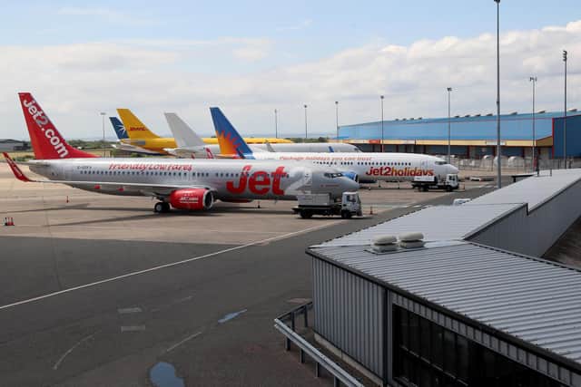 Planes at Belfast International Airport. Pic: Stephen Davison/Pacemaker