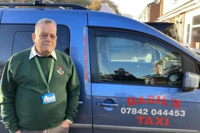 There was widespread criticism after John Brockhurst, owner of Basil's Taxi based in Market Drayton, was ordered to remove the Flag of St George from his vehicle. Photo by BBC