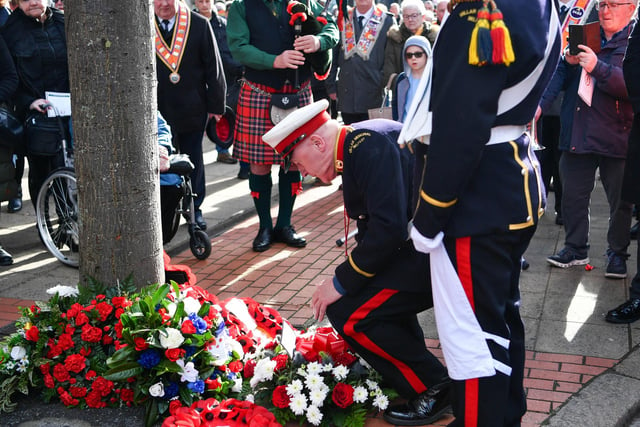 Wreaths are laid in memory of Frederick Starrett and James Cummings