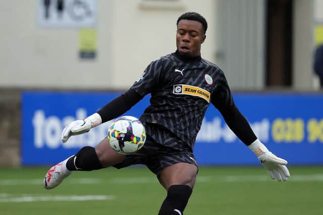 Goalkeeper David Odumosu has joined Cliftonville on a permanent basis